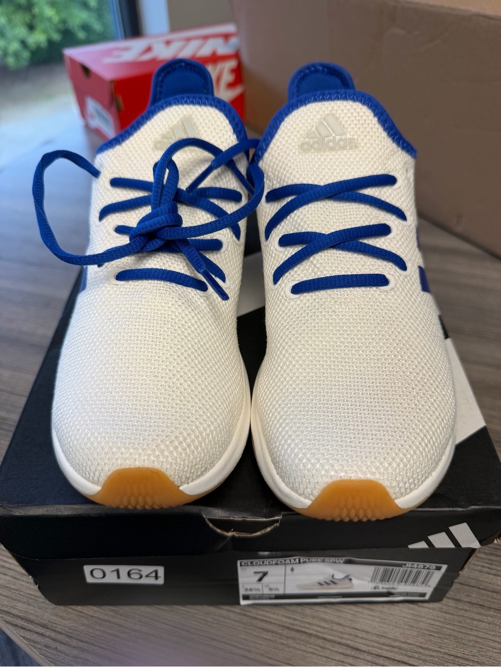 adidas White Sneakers with Blue Trim and Gum Toe